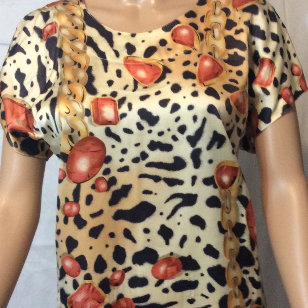 ESCADA BY MARGARETHA LEY BEAUTIFUL & VIBRANT SILK BLOUSE ANIMAL PRINT.